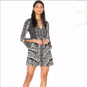 🪁 Free People high neck cutout flare sleeves